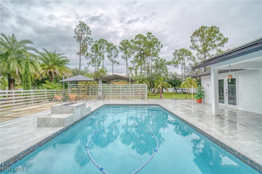 a view of outdoor space and swimming pool