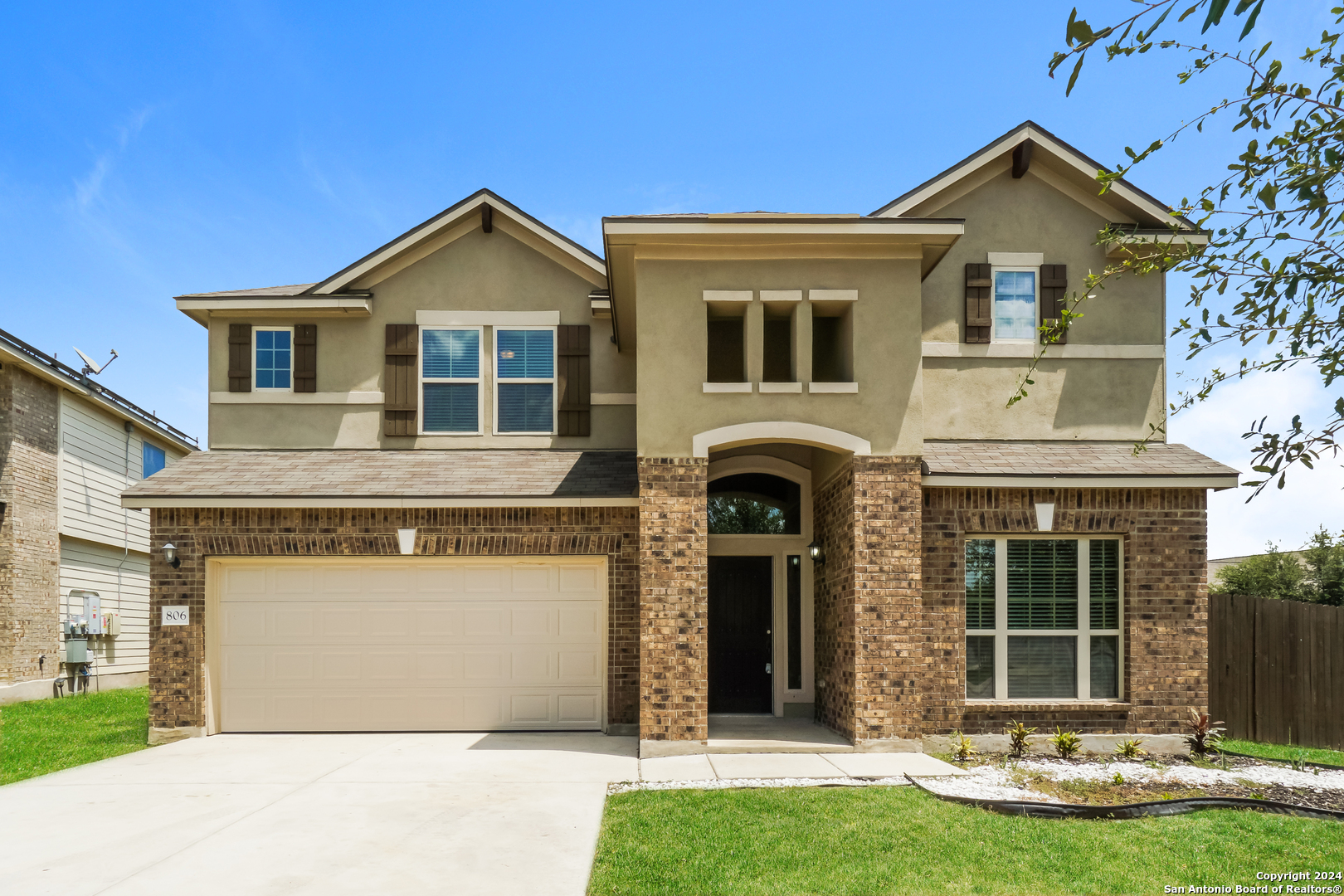 front view of house with a yard