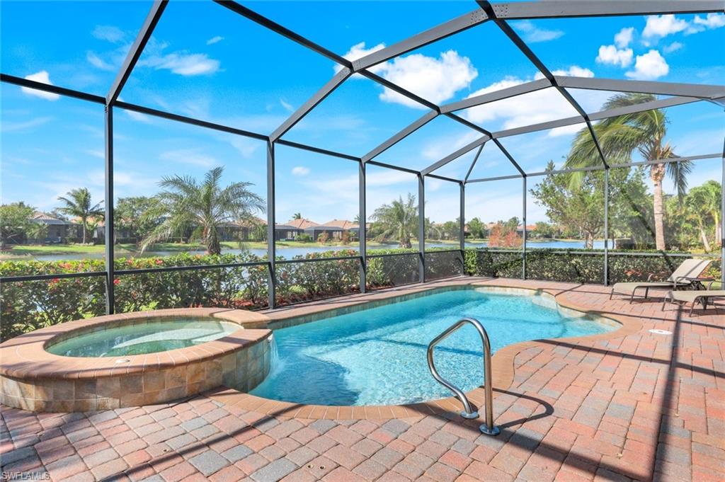 a view of swimming pool from a lounge chair