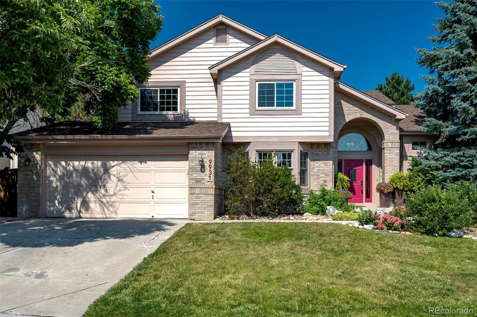 a front view of house with yard