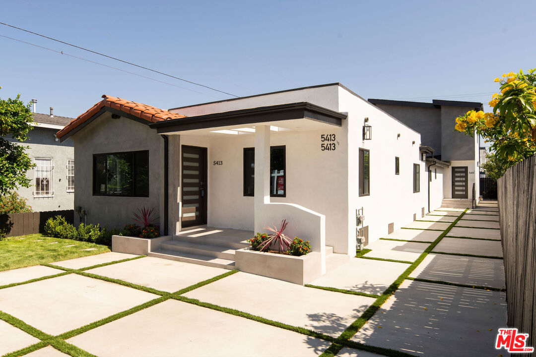 a front view of a house with a porch