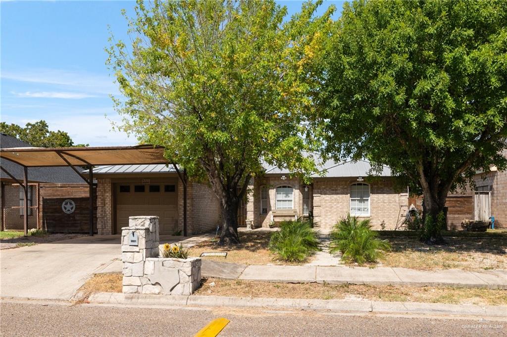 front view of a house with a patio