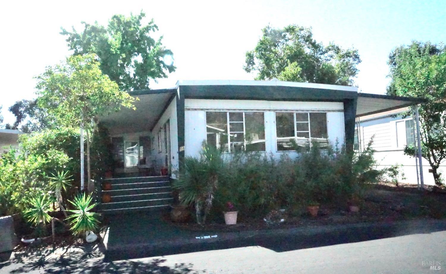 Welcome HOME to 61 Coronado Circle in Rancho Cabeza Senior Mobile Home Park.