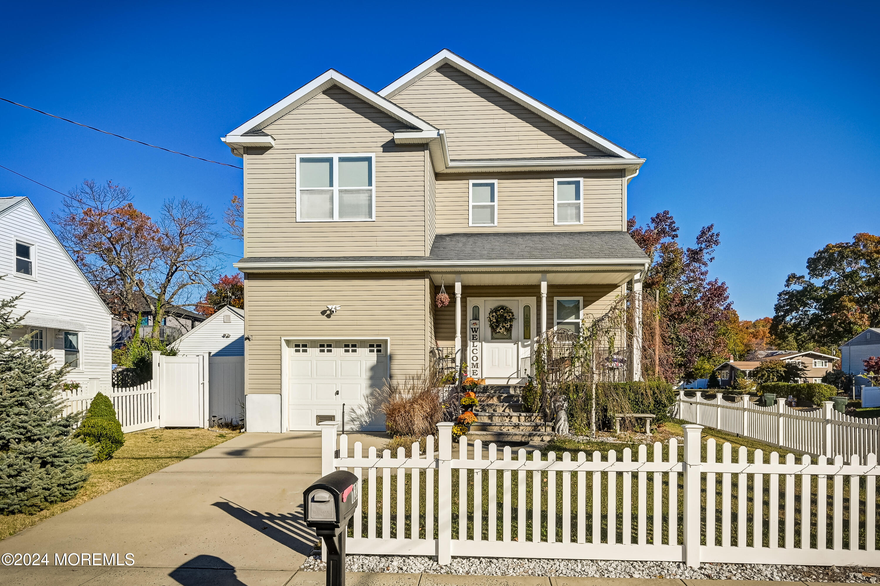 a front view of a house with a porch