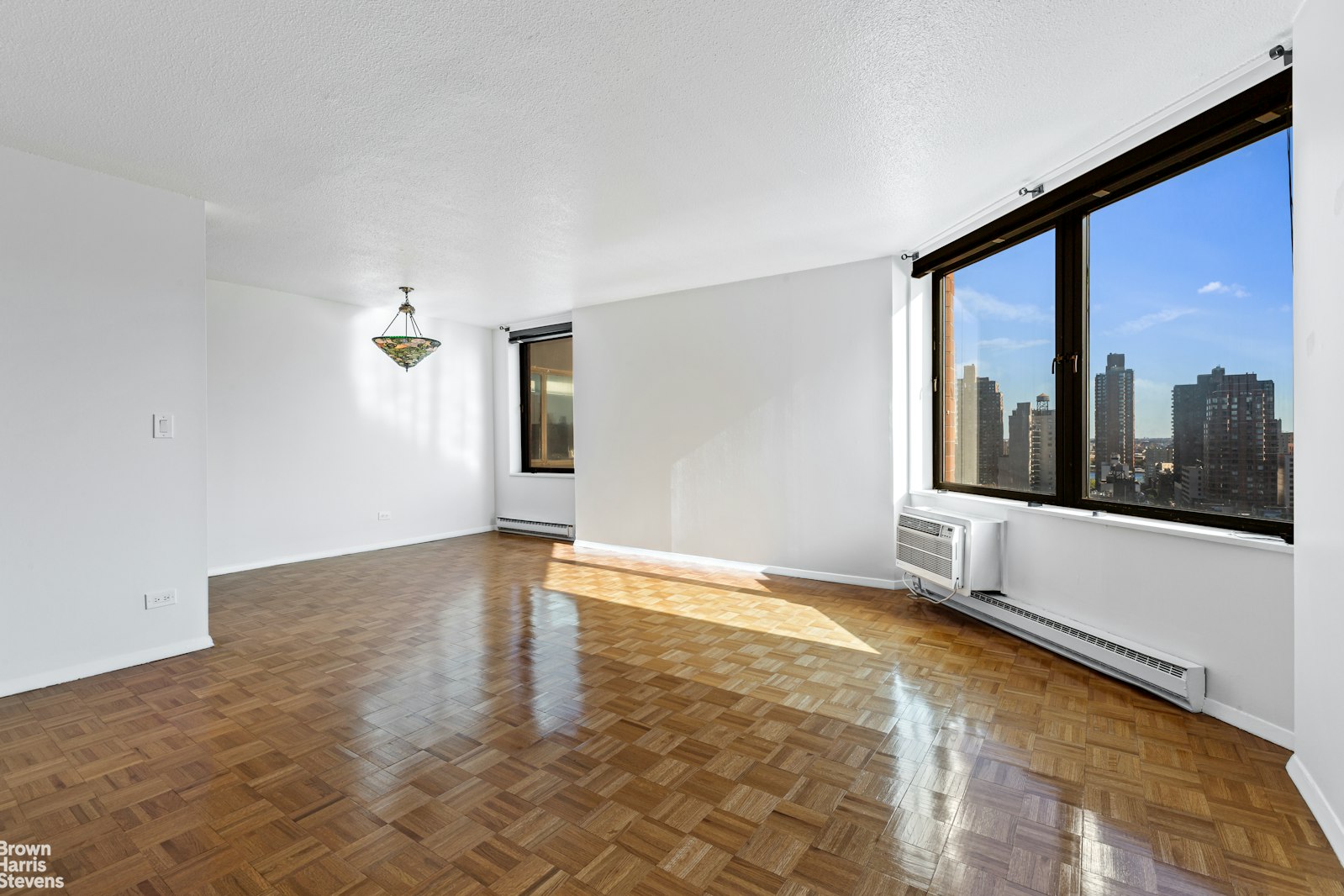 a view of an empty room with window