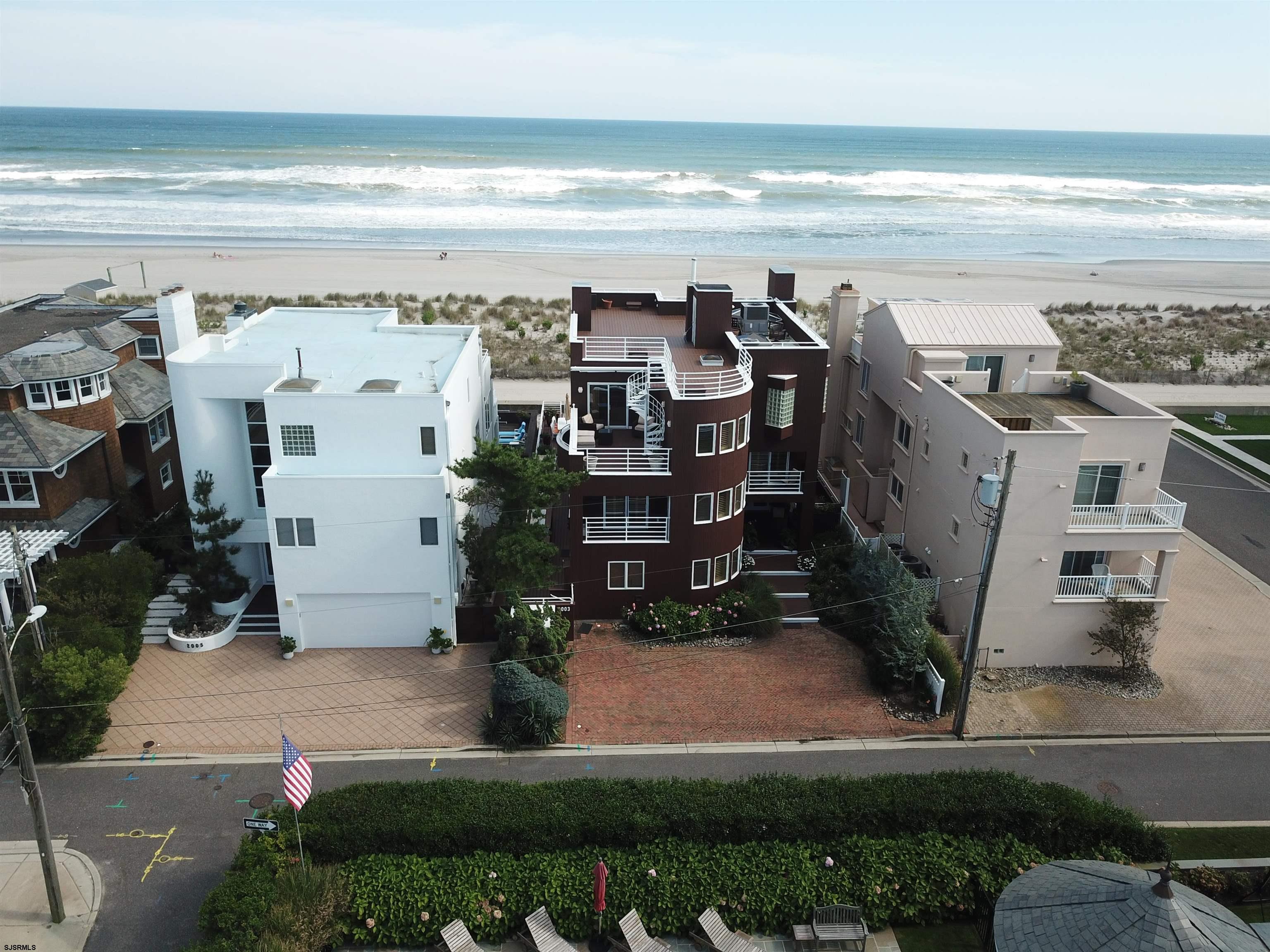 a view of a city with an ocean beach