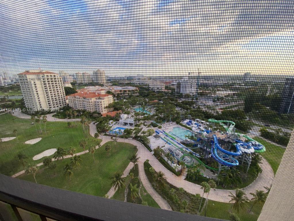 a view of swimming pool from a balcony