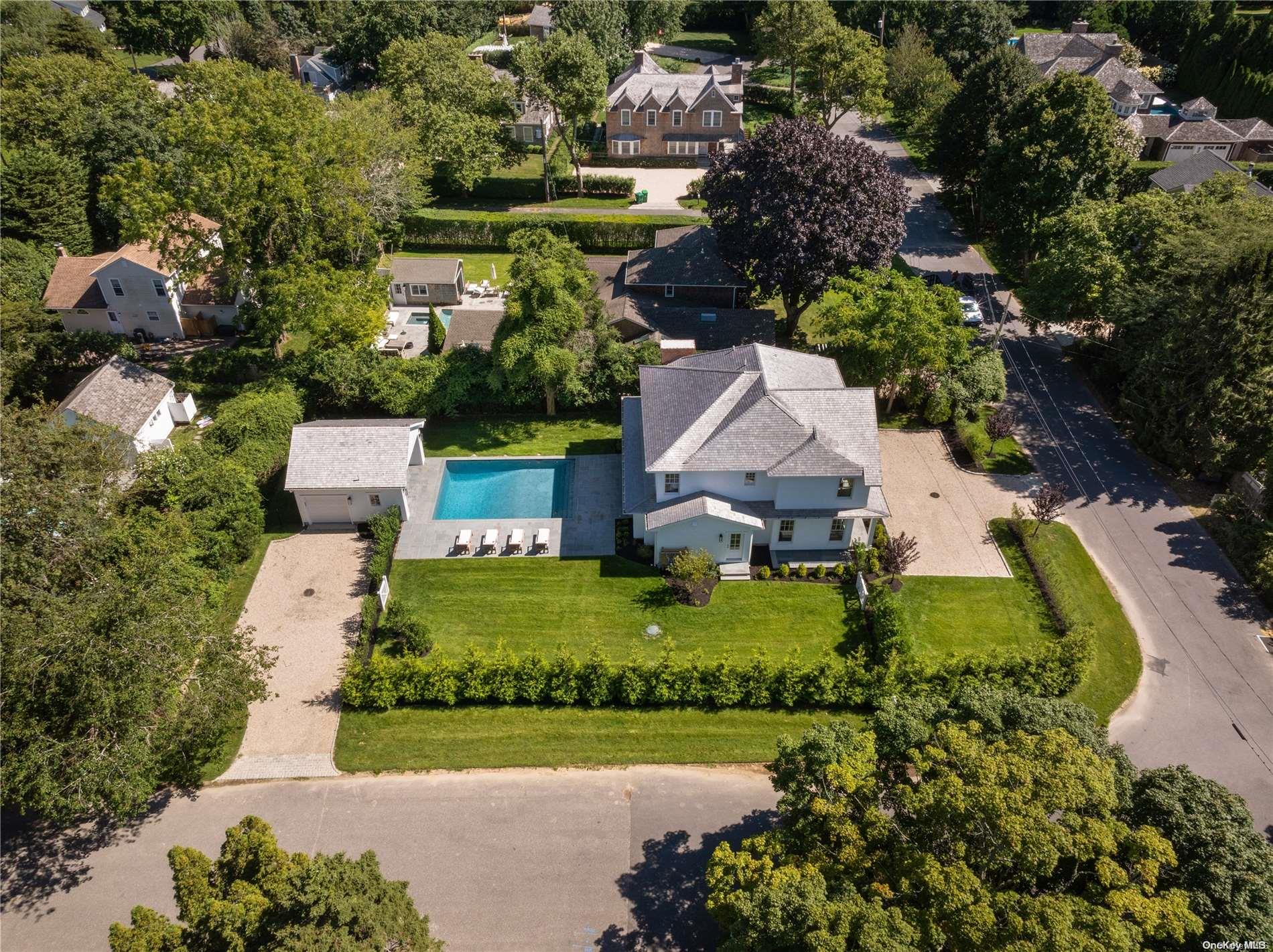 an aerial view of a house with a garden