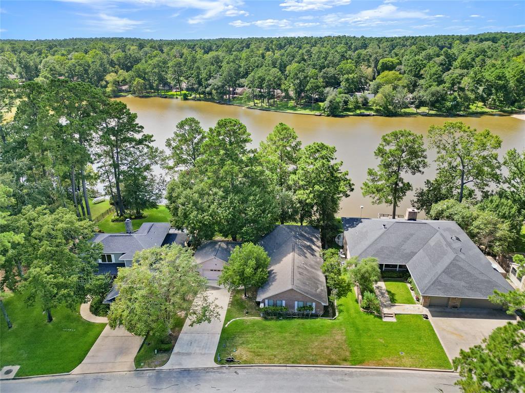 an aerial view of house with yard