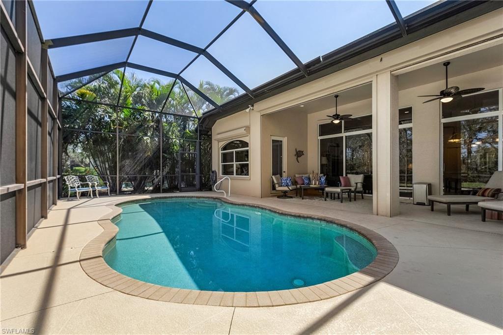 a view of a swimming pool with a patio