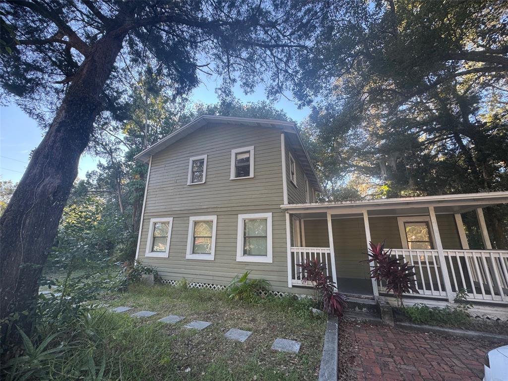 front view of a house with a yard