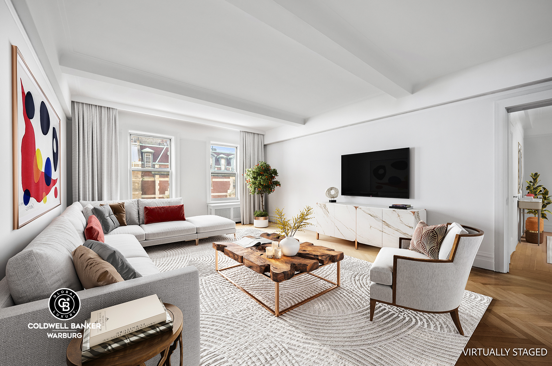 a living room with furniture and a flat screen tv