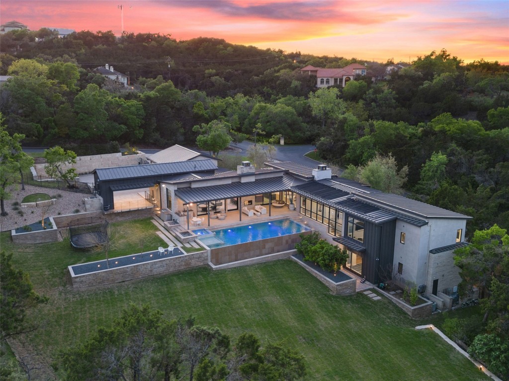 an aerial view of a house having yard