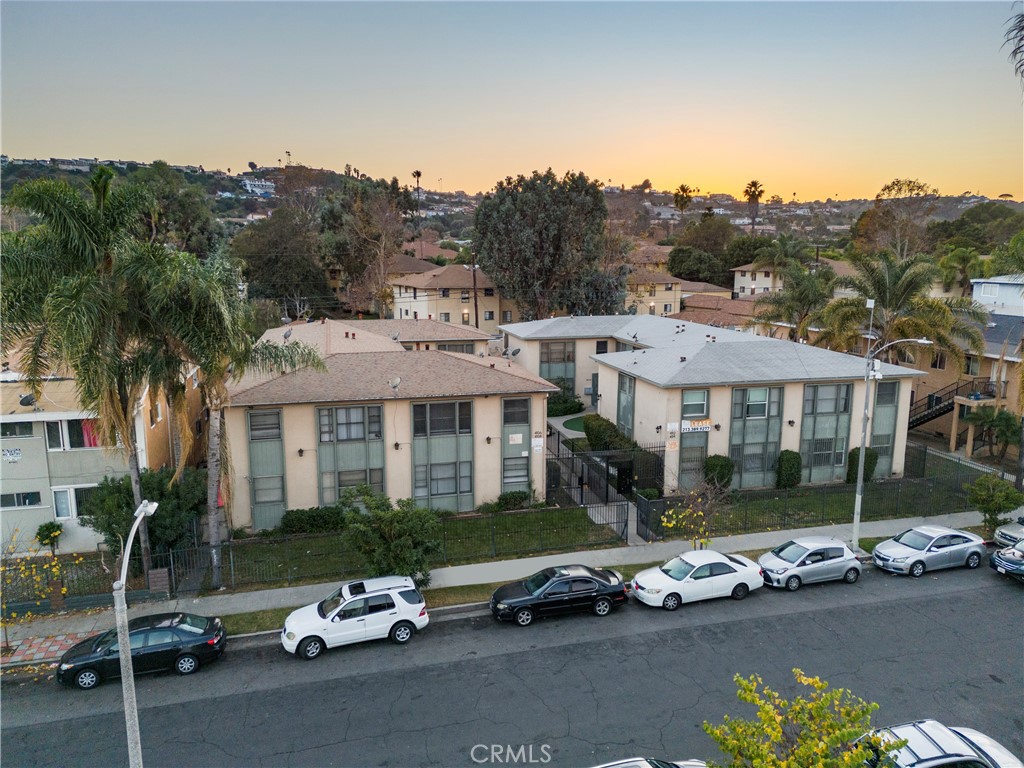 an aerial view of a house with a garden and plants