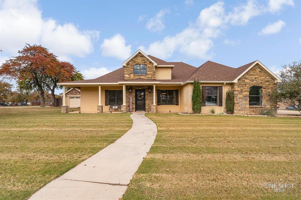 a front view of a house with swimming pool