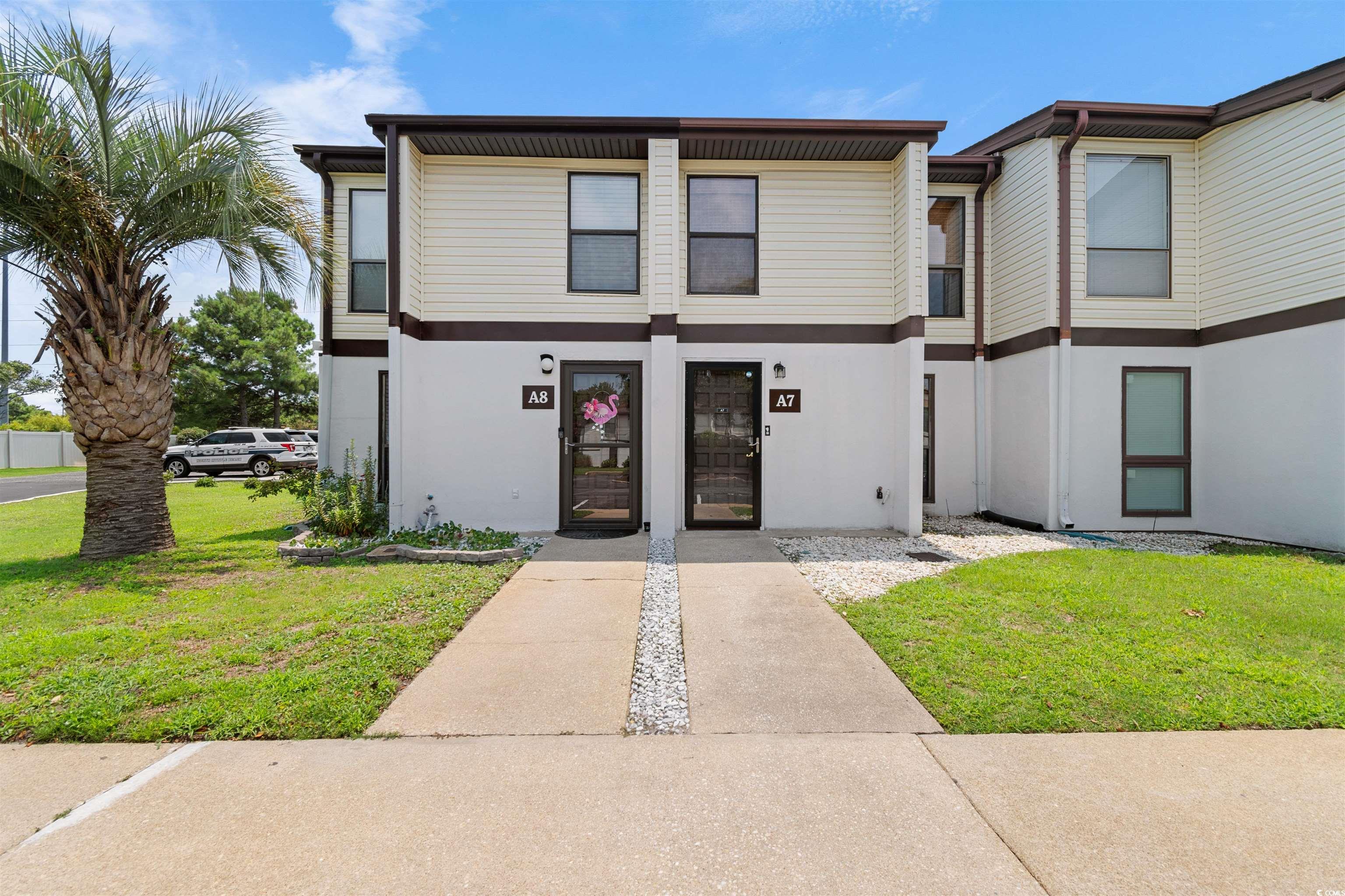 View of front of home with a front lawn