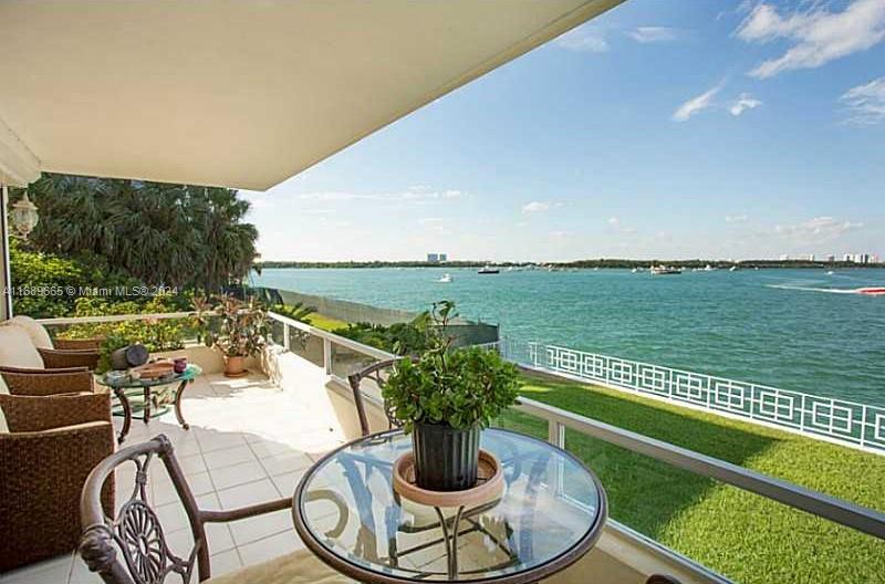 a view of a swimming pool and lounge chair