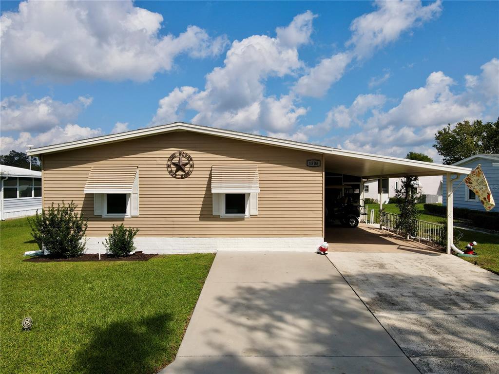 a front view of house with yard