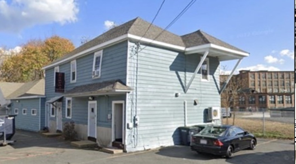 a car parked in front of a house