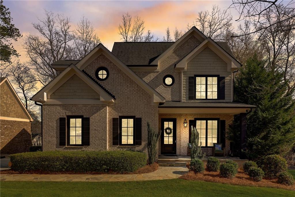 front view of a house with a yard