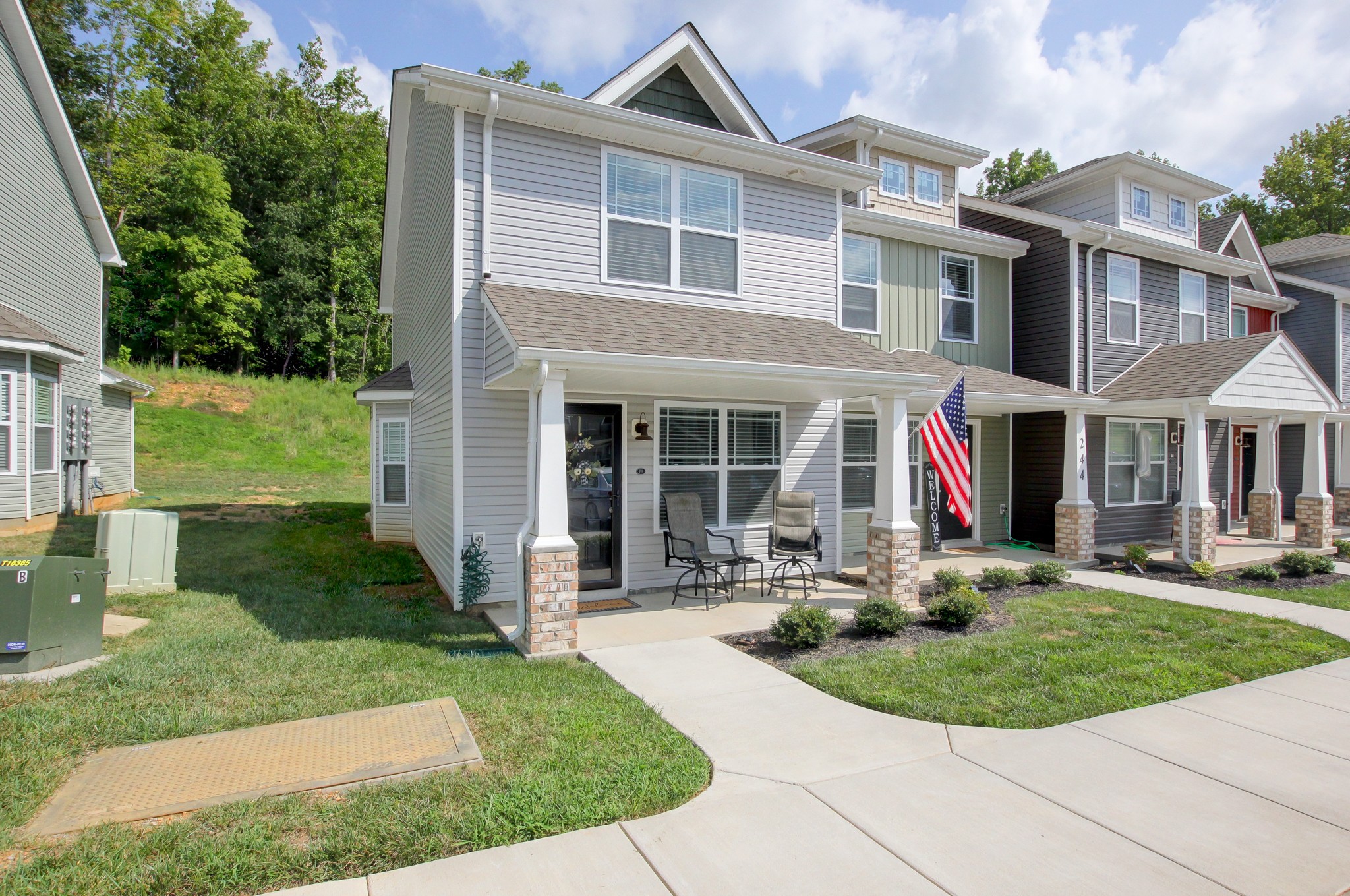 front view of a house with a yard