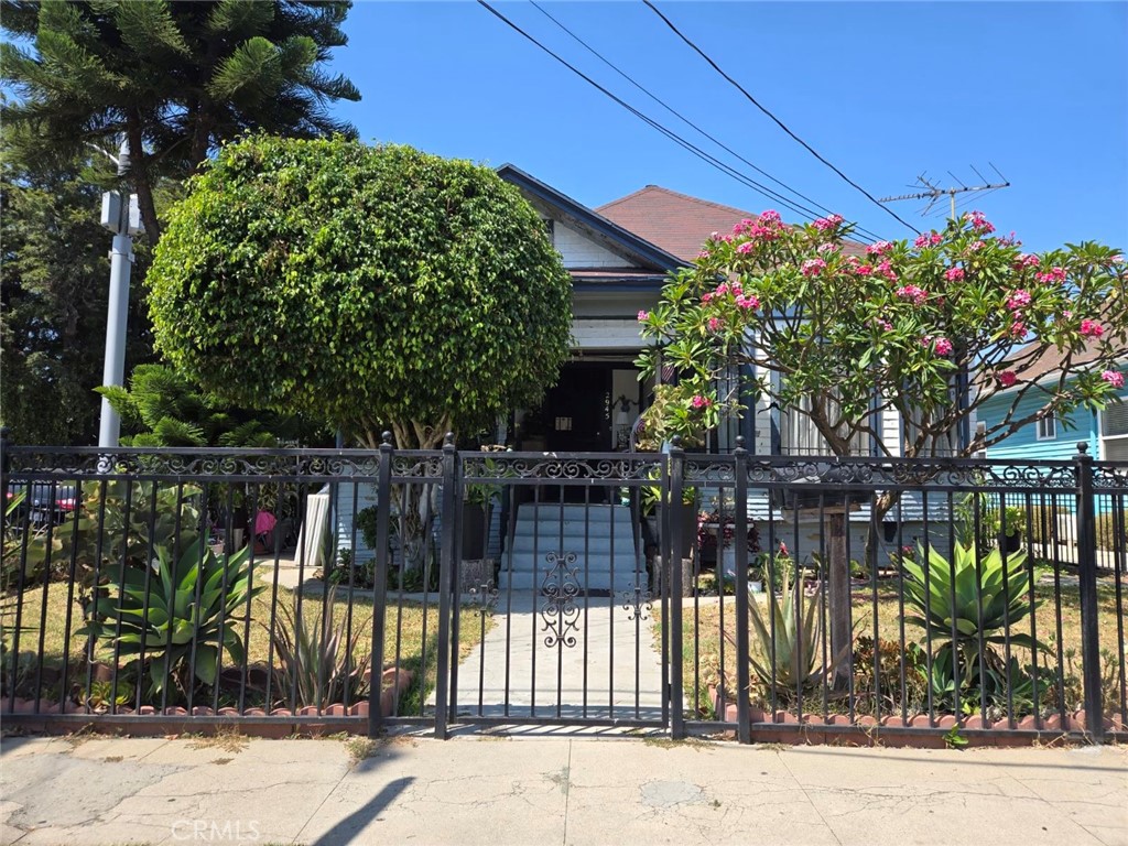 front view of a house with a garden