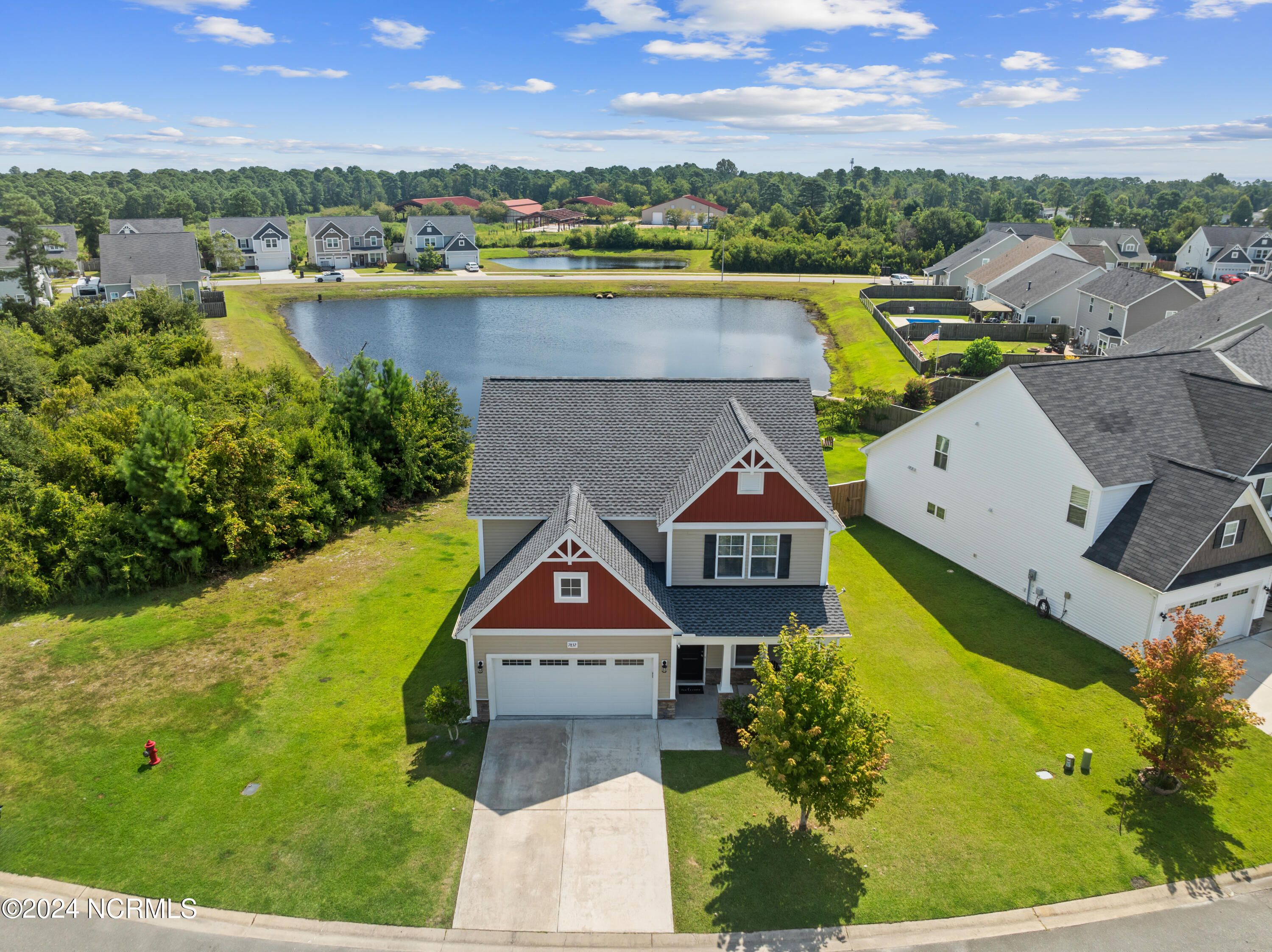 Corner lot on peaceful fishing pond