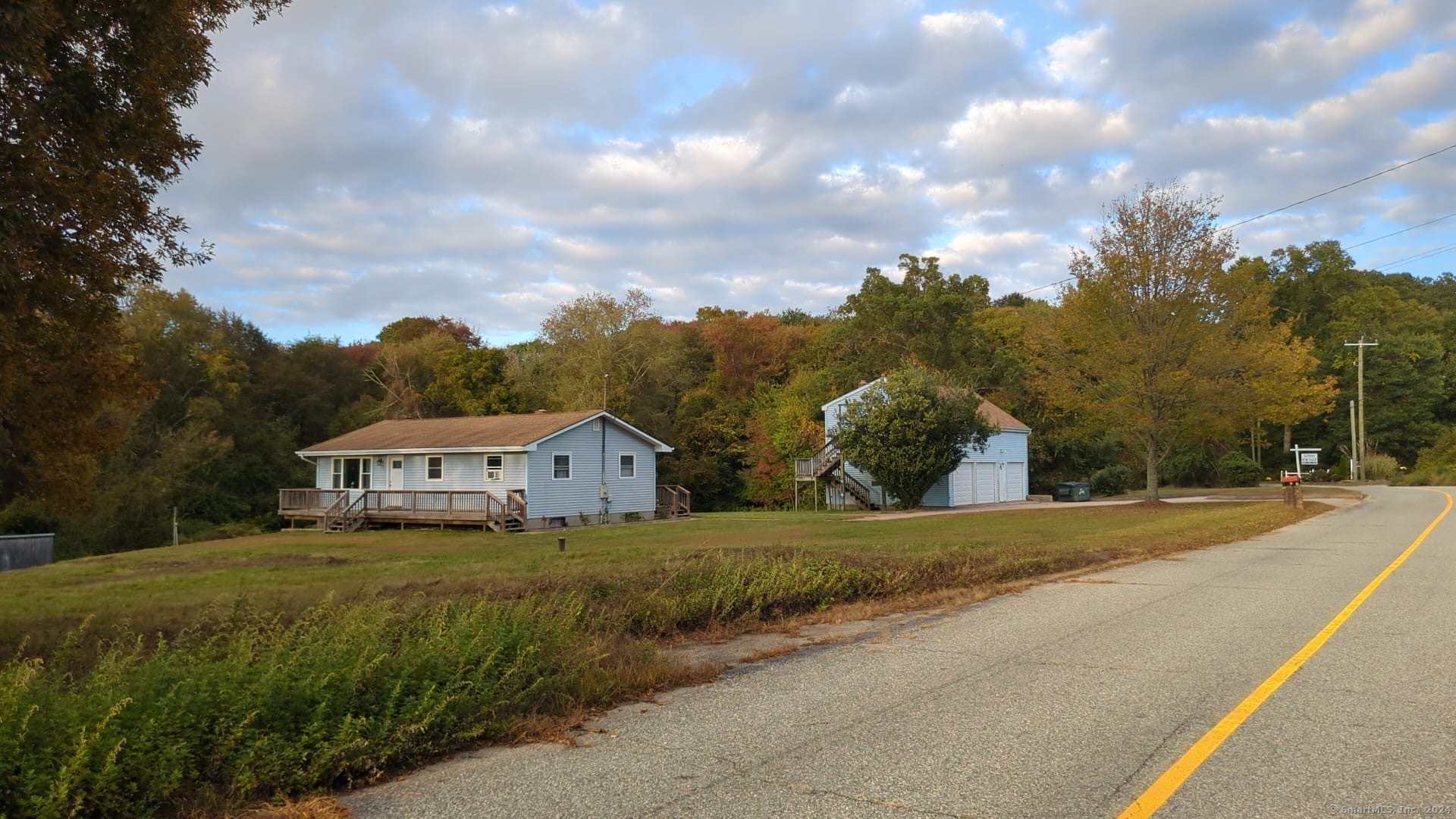 a view of a house with a big yard