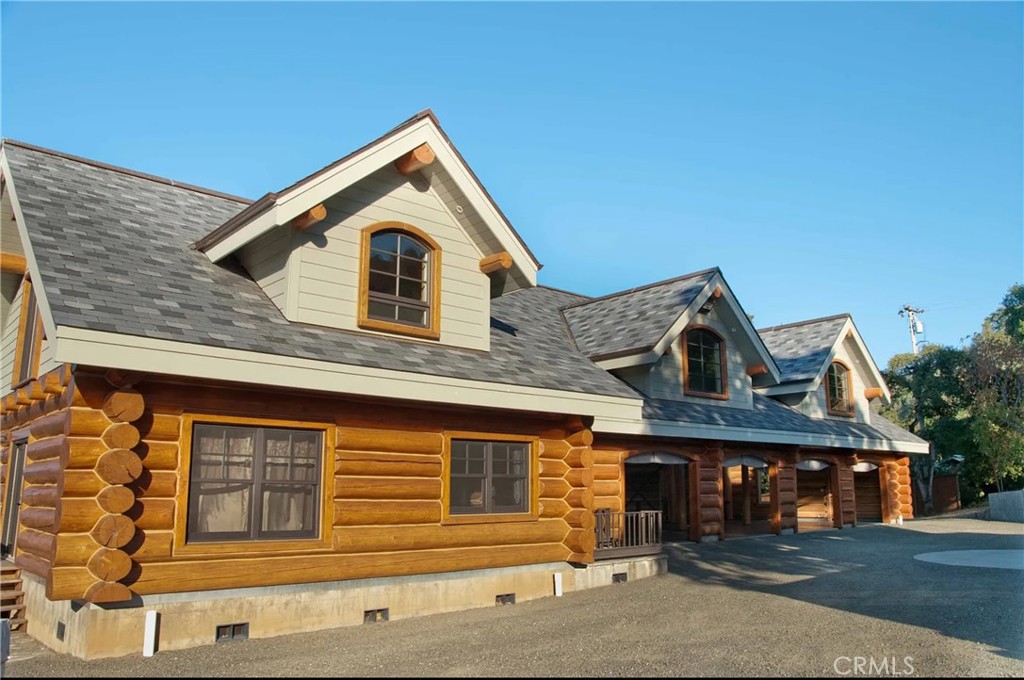 a front view of a house with a garage