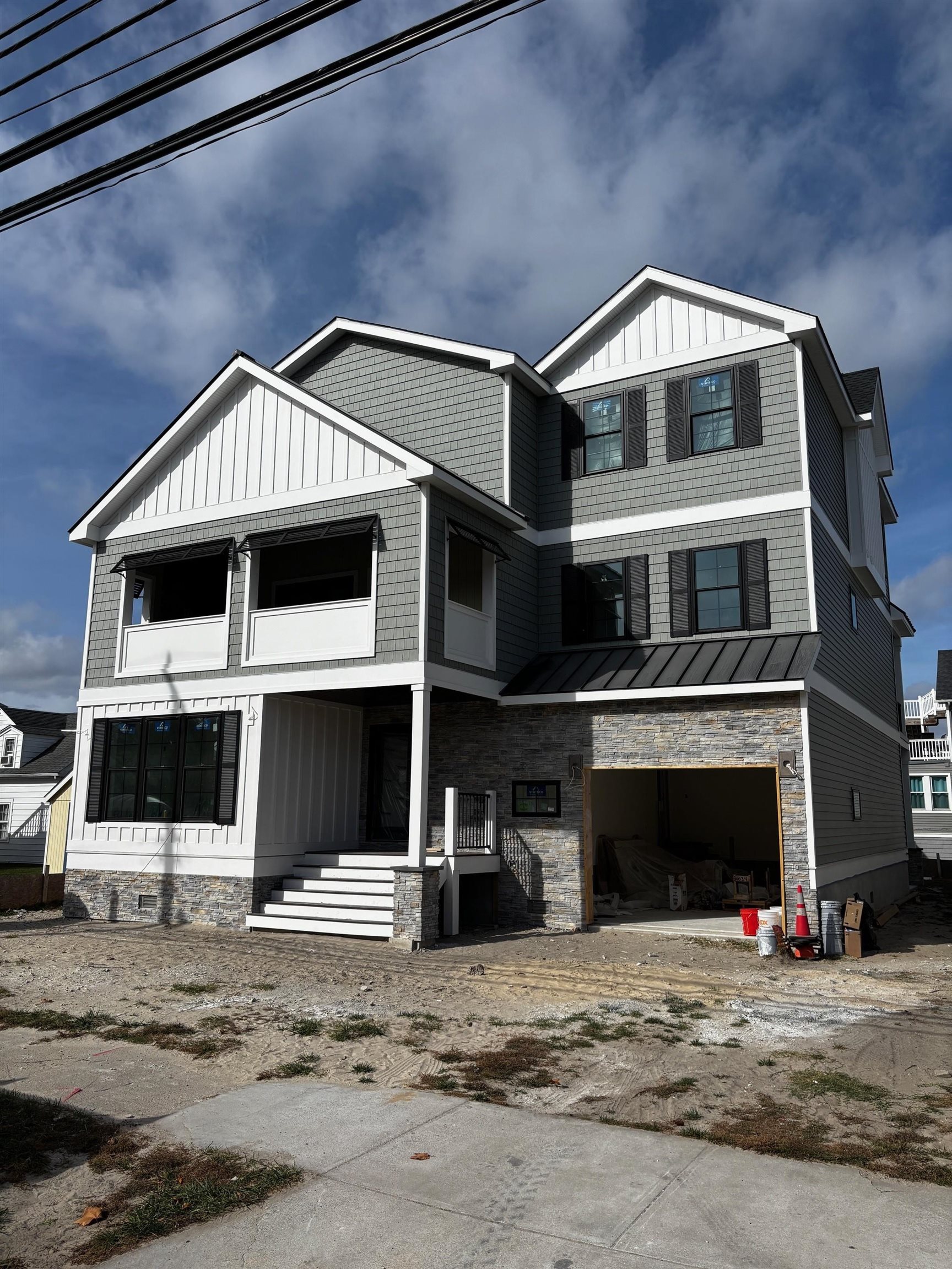 a front view of a house with a garage