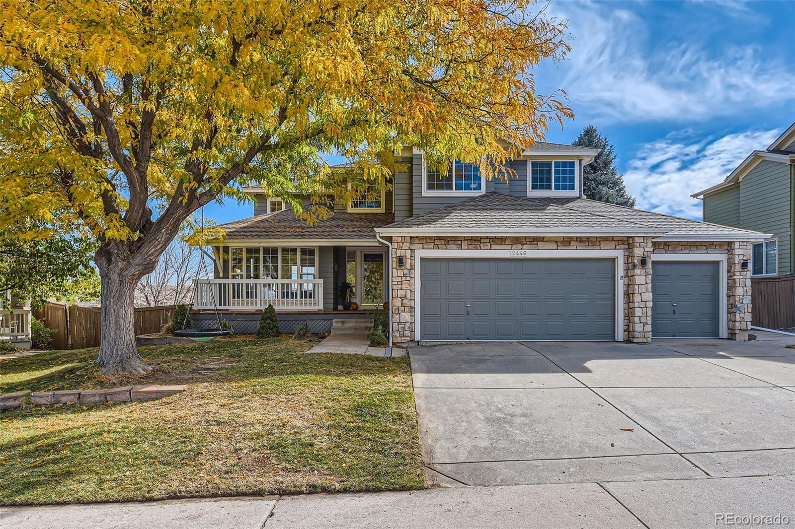 front view of a house with a yard