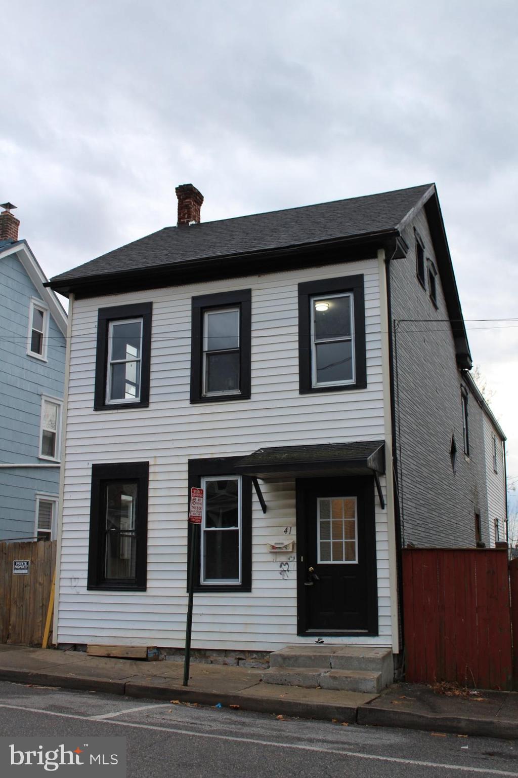 a front view of a house with a garage