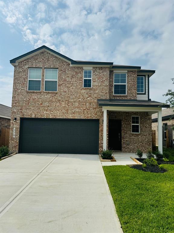 a front view of house with yard