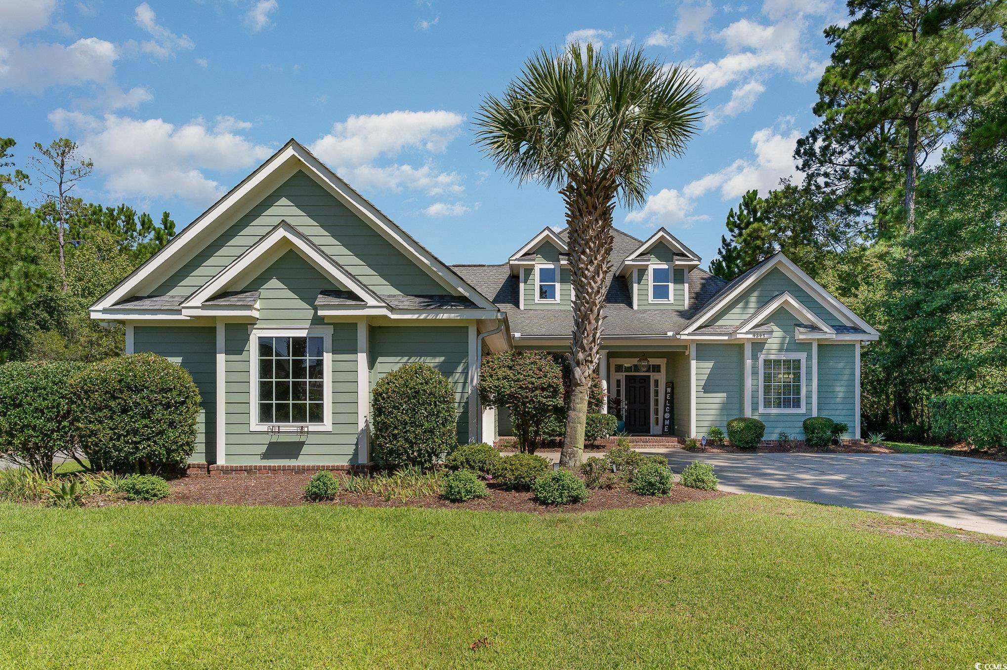 View of front of property featuring a front lawn