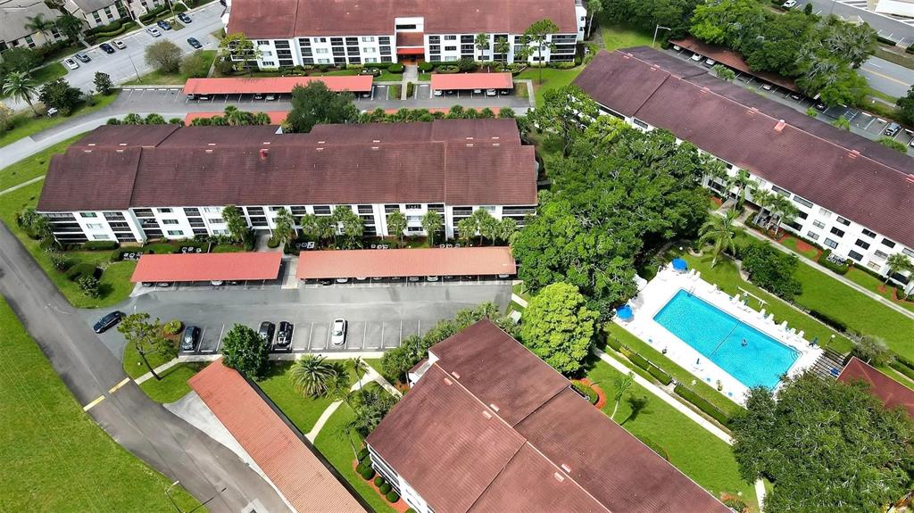 an aerial view of a house with a garden and plants