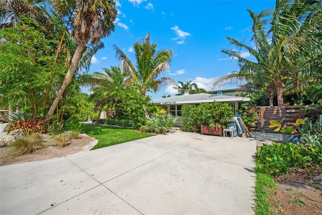 a view of a backyard with a patio