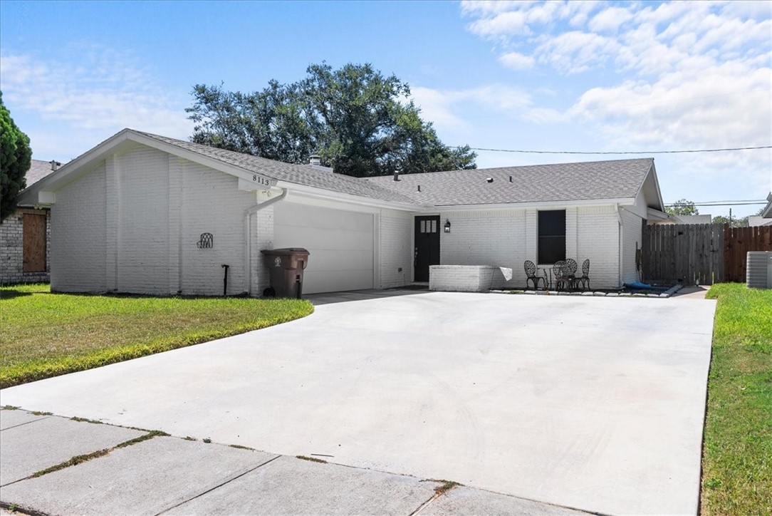 a view of a backyard of the house