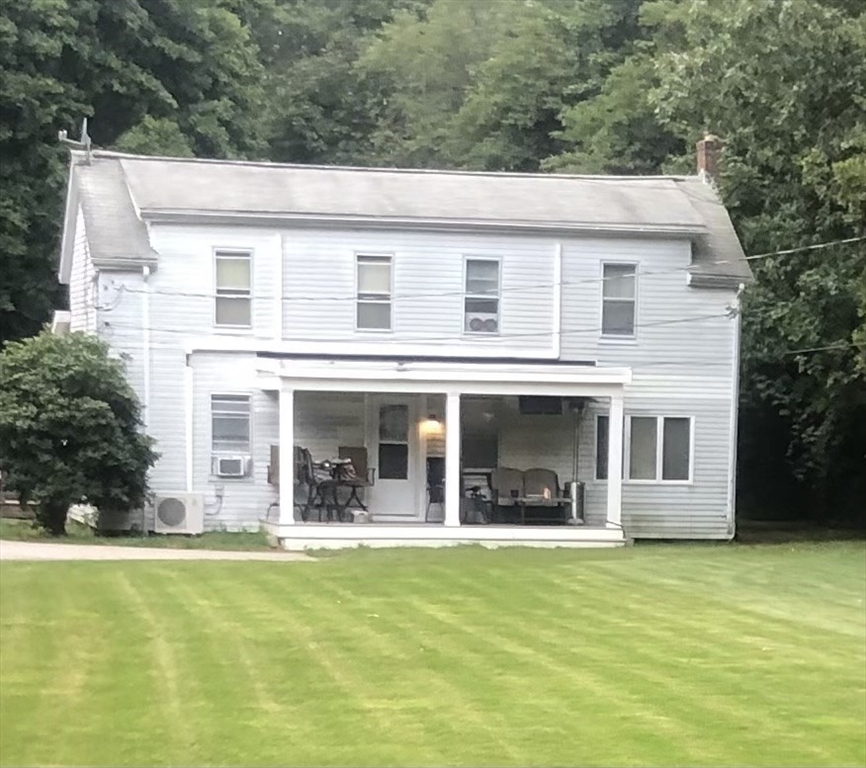 a view of a house with a swimming pool