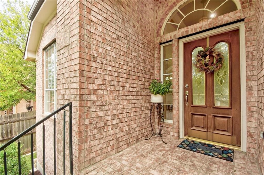 a front view of a house with a door