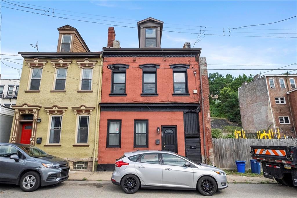 a car parked in front of a house