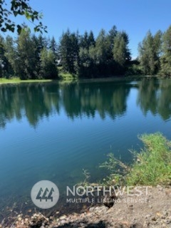 a view of a lake with an outdoor space