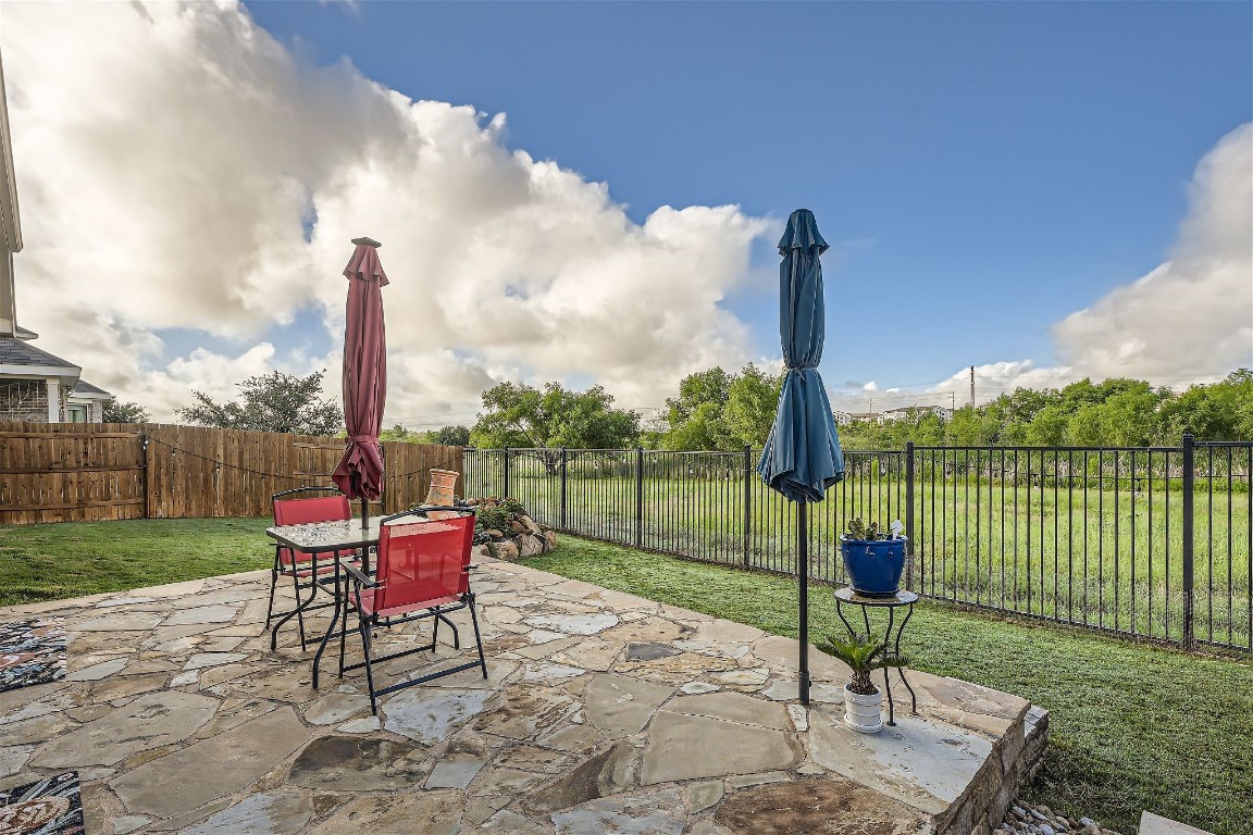 a garden view with a sitting space and garden