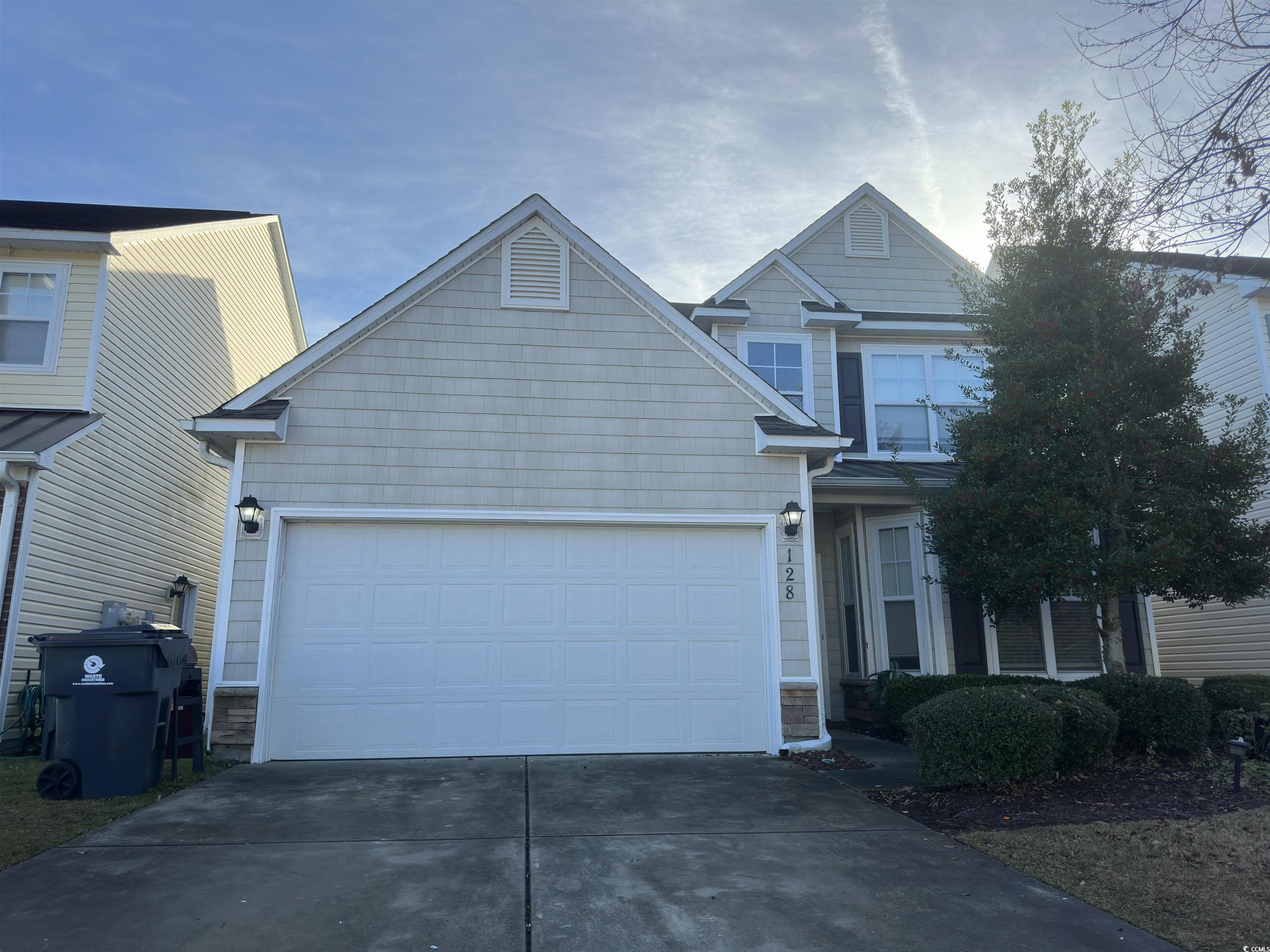 View of front of home with a garage