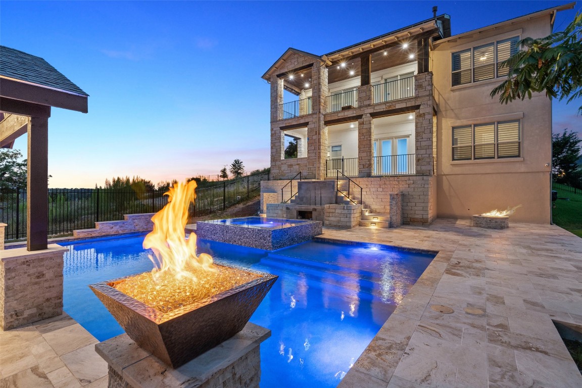 a front view of house with outdoor seating