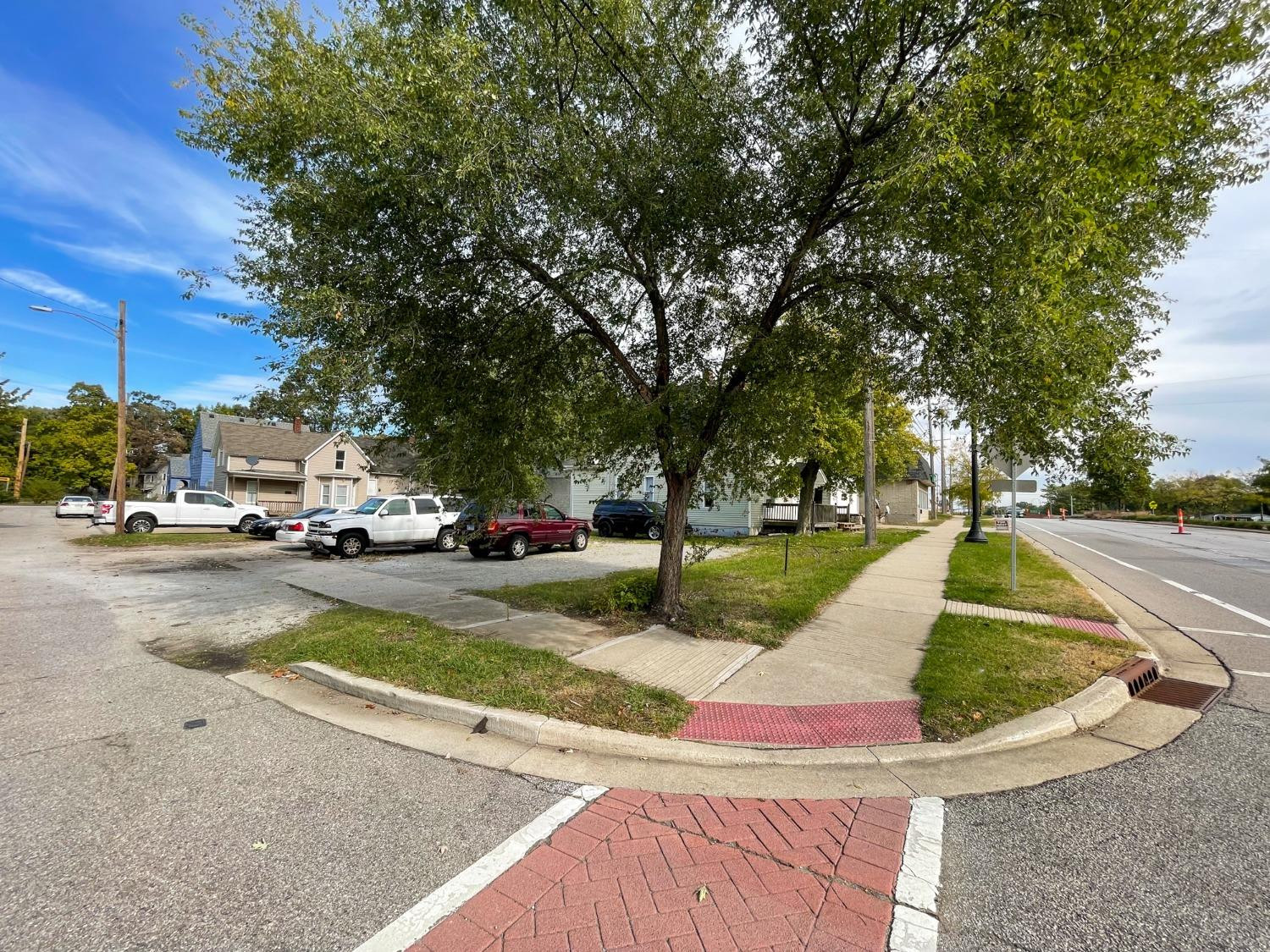 a view of a street with houses