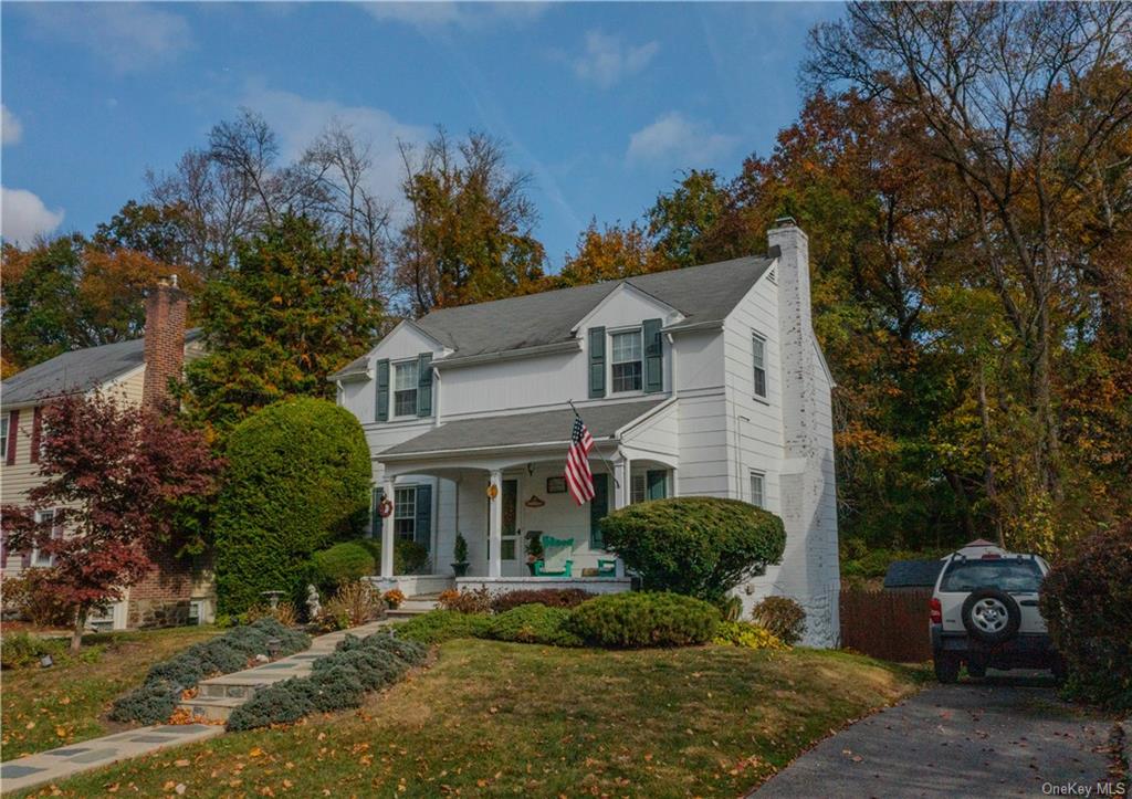 Settle down on this quiet cul-de-sac surrounded by New Rochelle's Nature Study Woods.