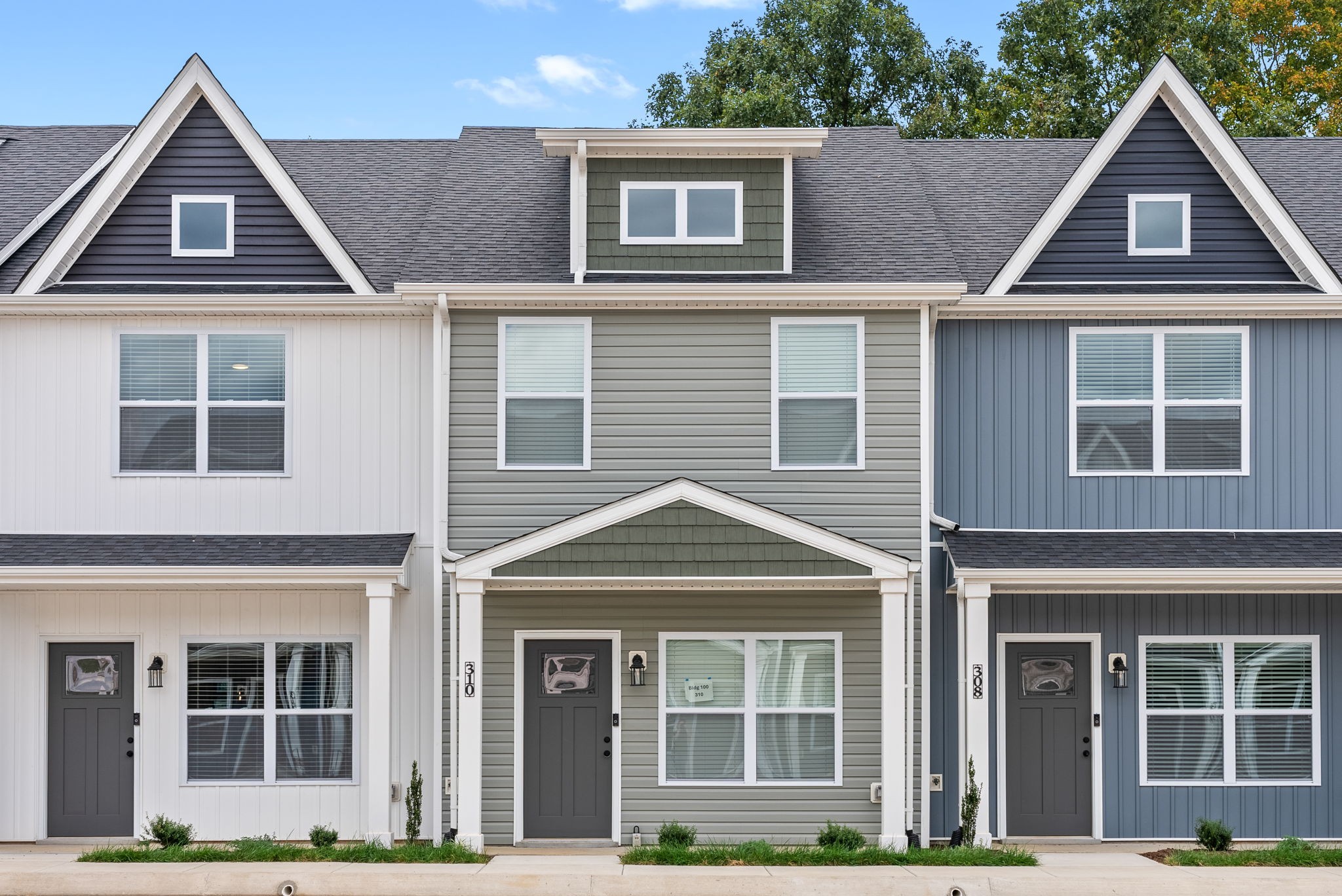 front view of a house with a yard