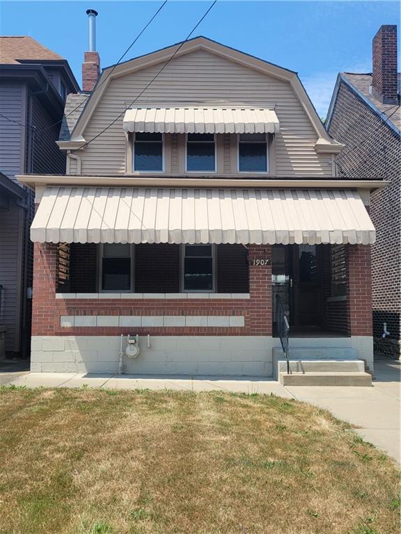 a view of house with front door