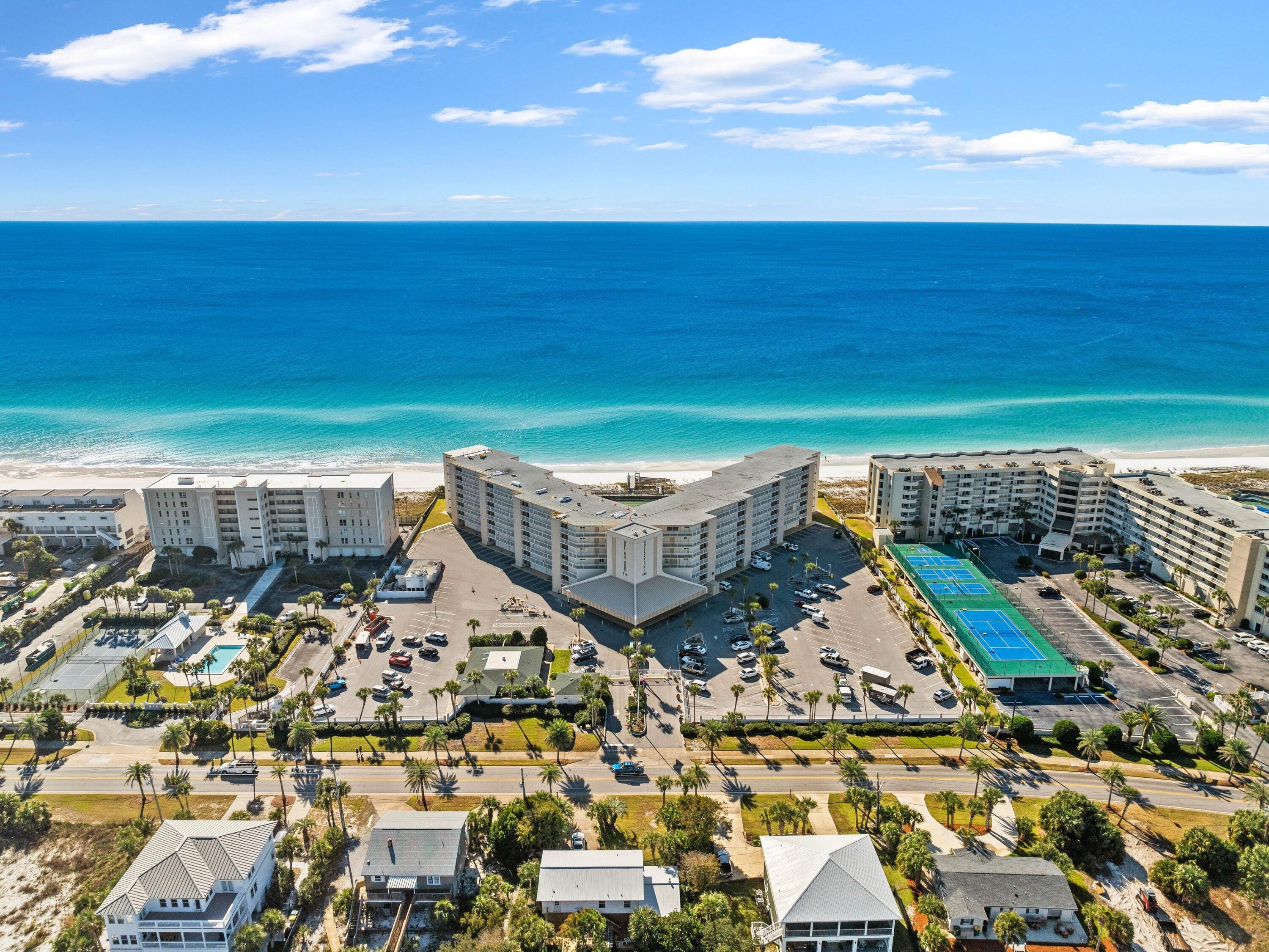 a view of a balcony with an ocean view