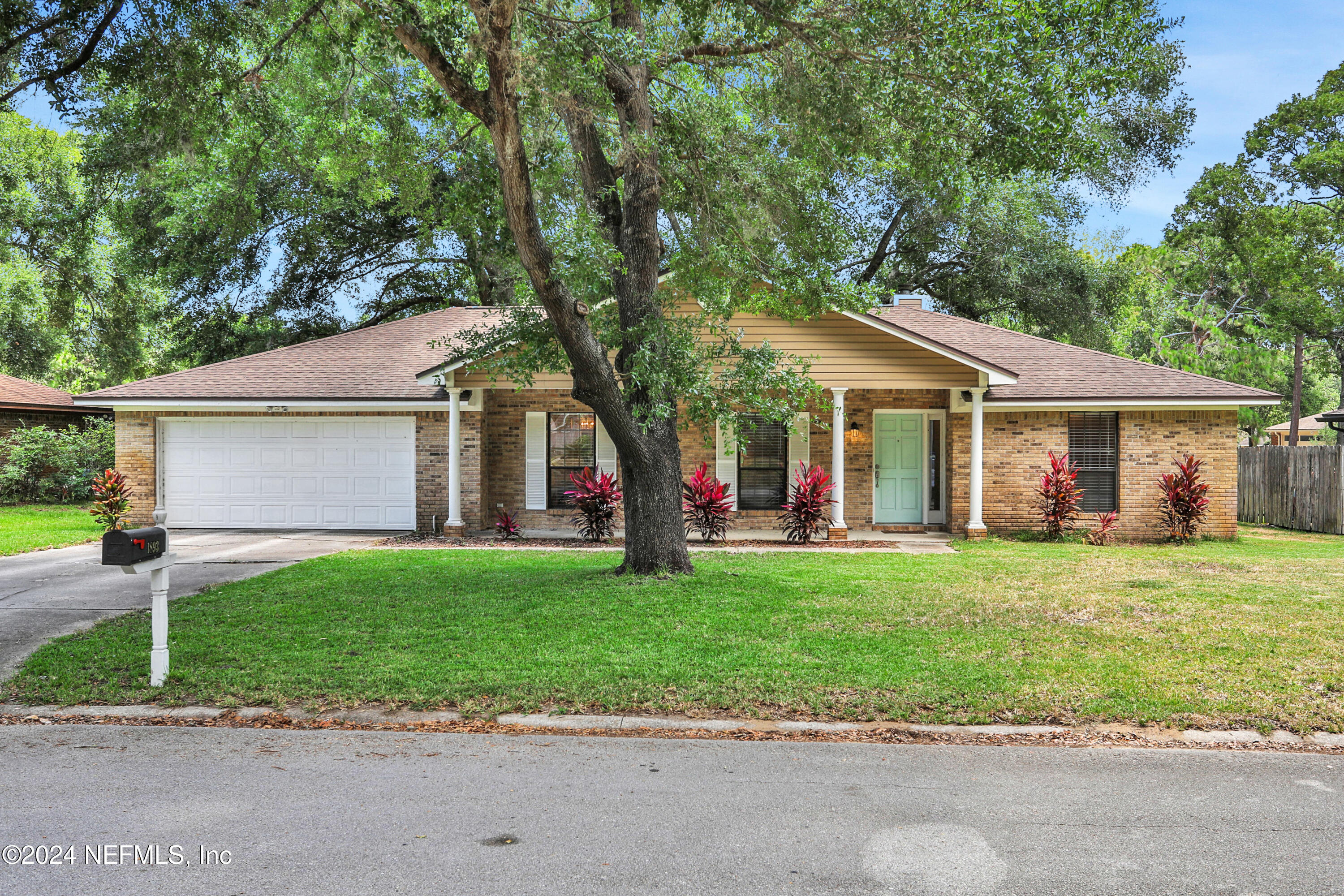 front view of a house and a yard